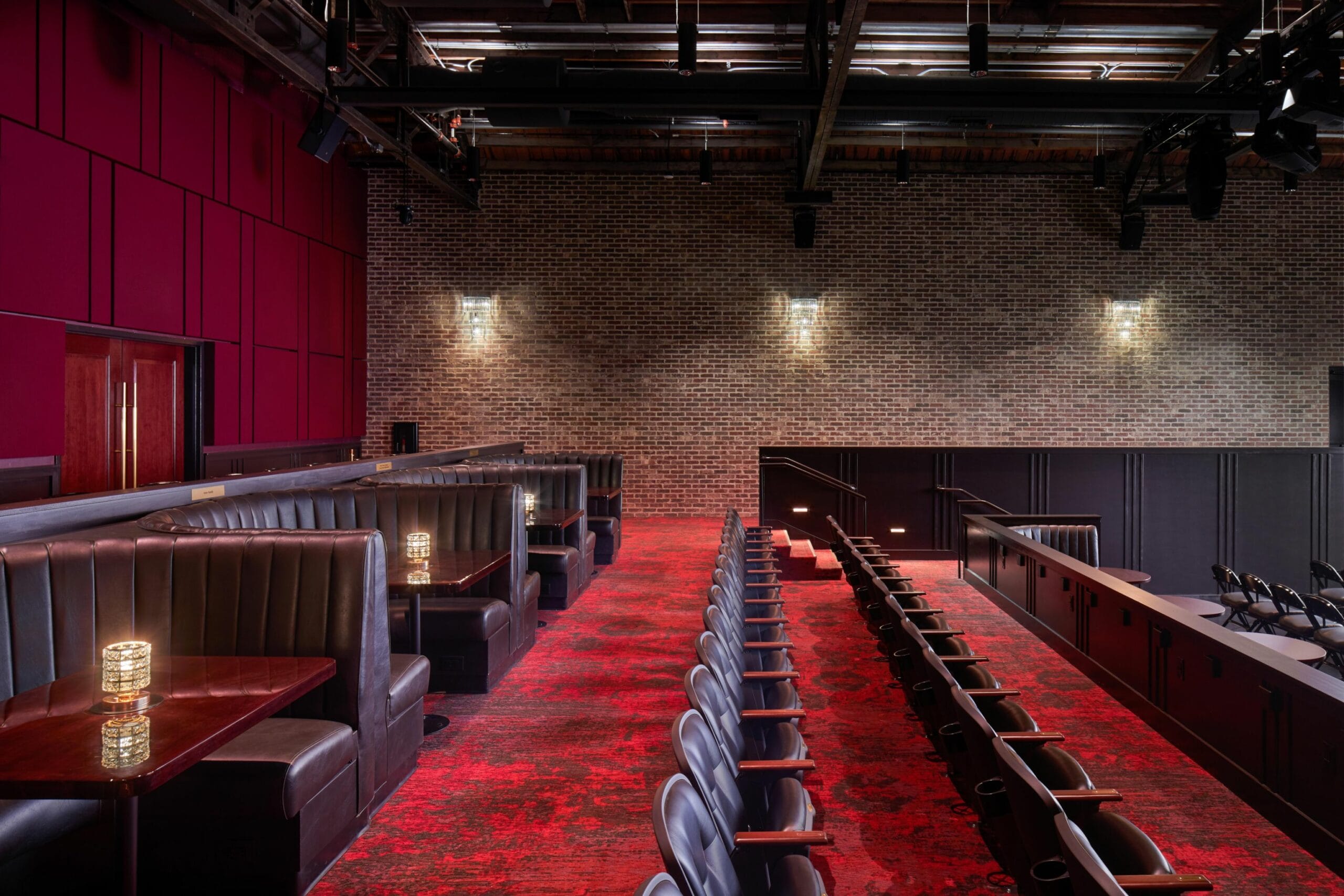The Benson Theatre auditorium set with cabaret booths and cocktail tables